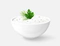 Bowl of white dipping sauce Ranch or Tzatziki with herbs parsley and dill